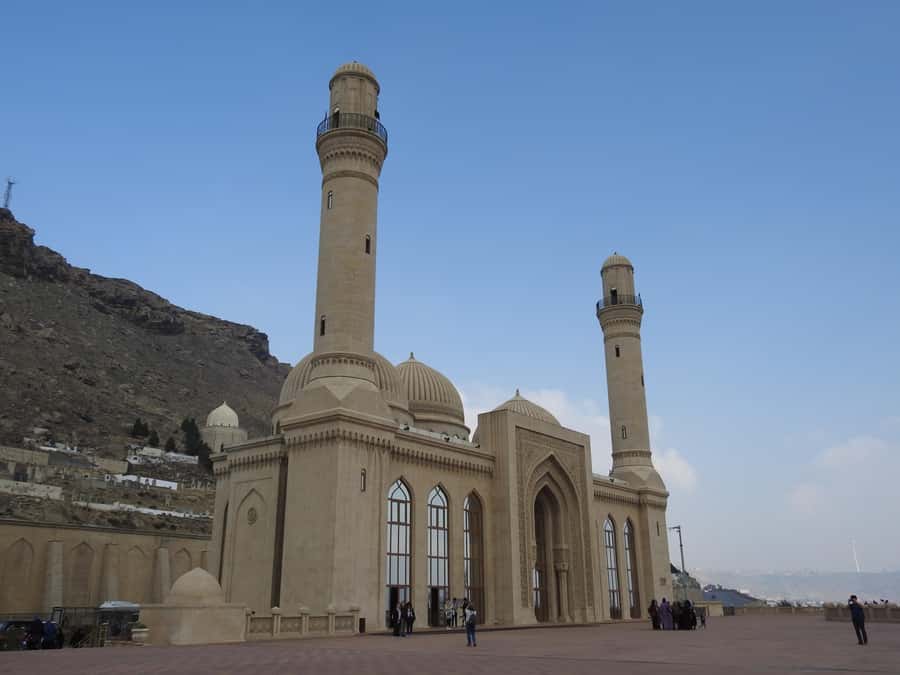 Baku: Gobustan, Volcanoes, Fire Temple and Yanardag Day Trip - Yanardag and the flame on the hillside