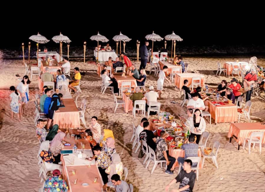 Bali: South Coast Uluwatu, Tanah Lot, and Jimbaran Day Trip - Jimbaran Bay seafood after dark