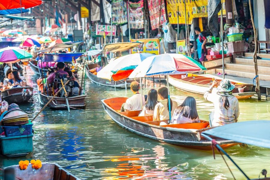 Bangkok: Damnoen Saduak, Train Market & Mahanakhon Day Trip - Riding the train into Maeklong Railway Market
