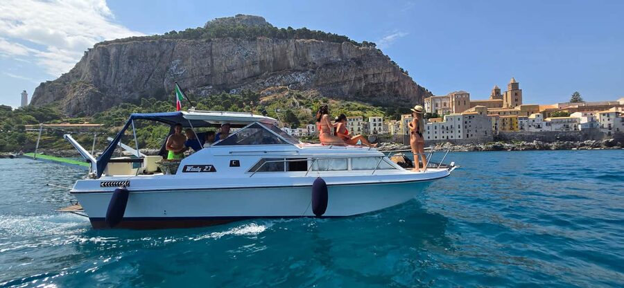 Cefalù: Coast-to-coast boat day trip with snorkeling and aperitif - At a glance