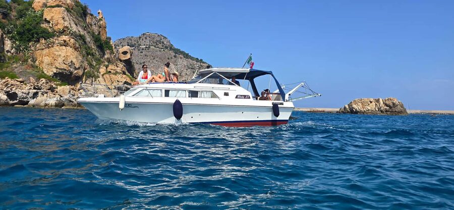 Cefalù: Coast-to-coast boat day trip with snorkeling and aperitif - Leaving Cefalù by boat