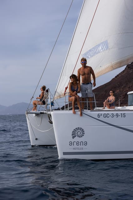 Corralejo: Adults-Only Catamaran Day Trip to Lobos Island - Sailing past the lighthouse and fishing village