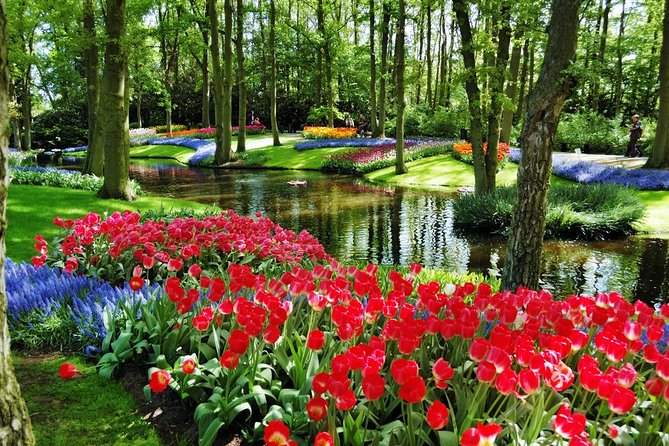 Day Trip to Keukenhof Gardens from Amsterdam with Tour Guide - Entering the historical park at Oranje Nassau Pavilion