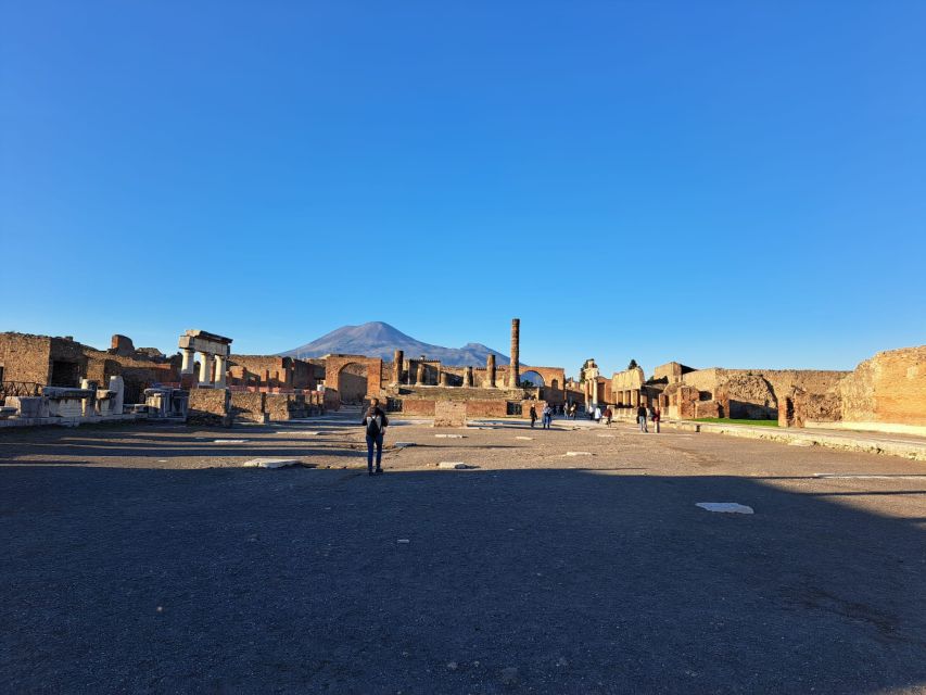 Day Trip to Pompeii & Vesuvius from Naples - Entering Pompeii with an archaeologist