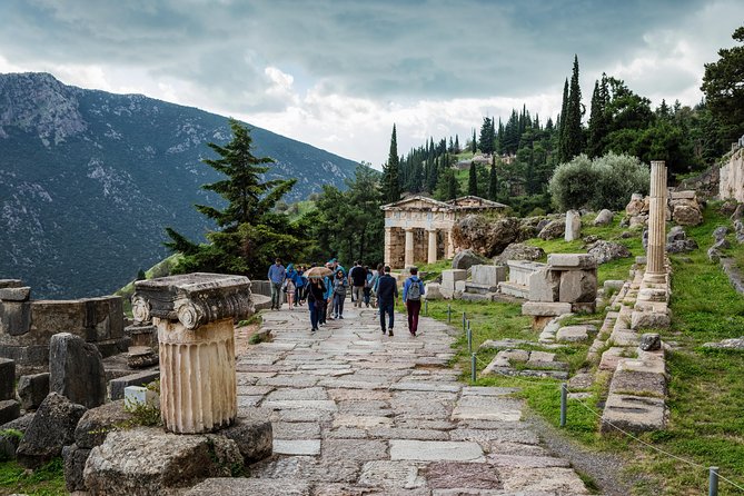 Delphi English Day Trip from Athens with Official Guide - Walking Through Ancient Delphi and the Temple of Apollo