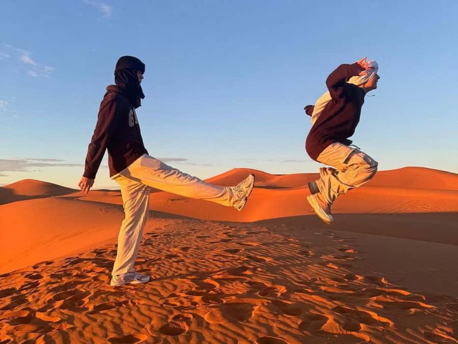 From Agadir: Sahara Desert Day Trip and Camel Ride - Sidi Rbat Beach and the cliffside fishing caves