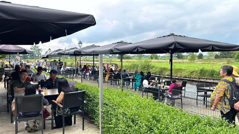 From Amsterdam to Giethoorn Day Trip - The one-hour boat ride through the canals
