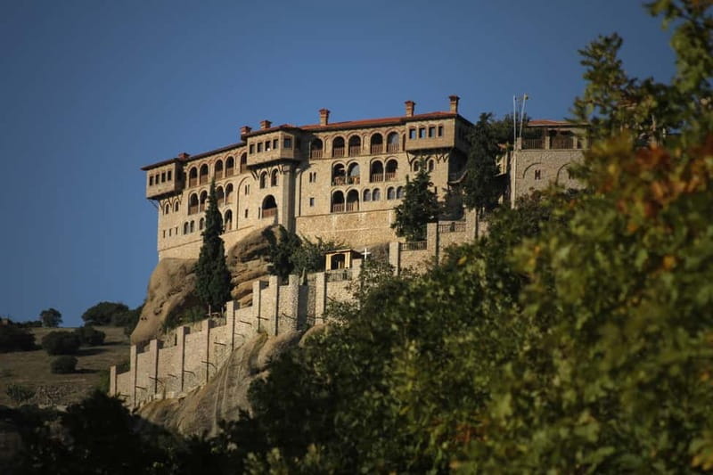 From Athens: Meteora Caves & Monasteries Day Trip by Train - Clothing, stairs, and monastery etiquette
