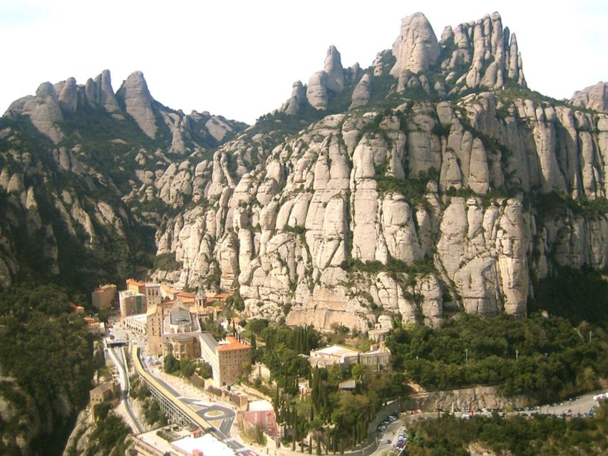 From Barcelona: Montserrat Full-Day Trip with Guided Hike - Riding the glass-roof St. Joan funicular