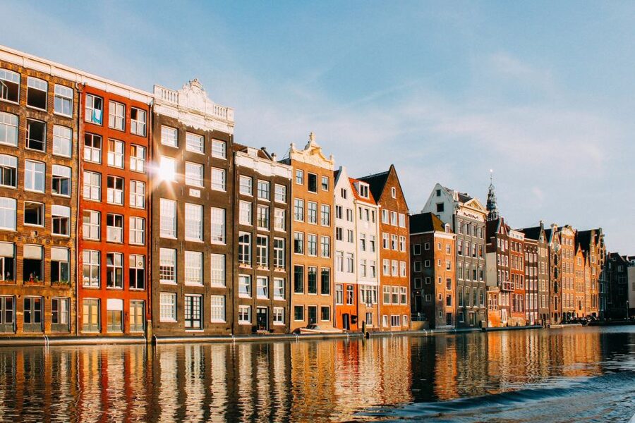 From Brussels: Cheese, Clogs & Windmills Amsterdam Day Trip - Crossing the Dutch border by coach