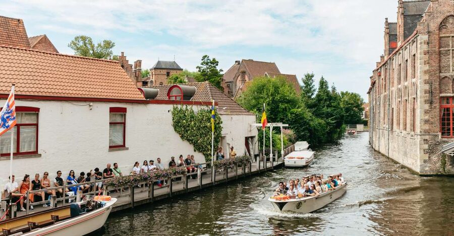 From Brussels: Guided Day Trip to Bruges and Ghent - Bruges begins with canals and quiet courtyards