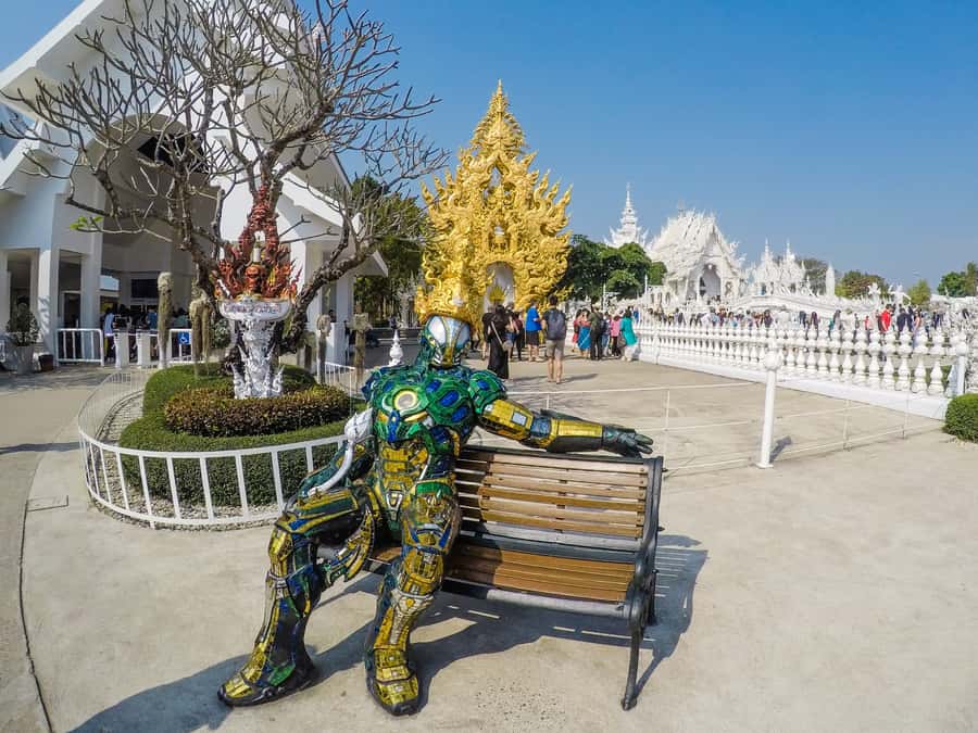 From Chiang Mai: White Temple & Golden Triangle Day Trip - A longtail boat on the Mekong River