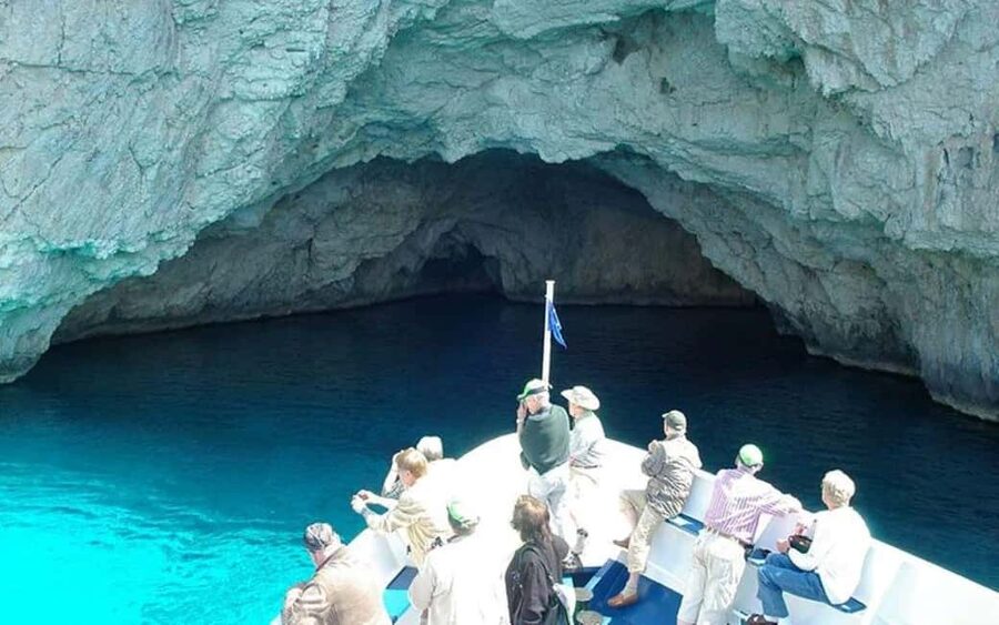 From Corfu: Paxos, Antipaxos & Blue Caves Day Trip by Boat - Leaving Corfu through Garitsa Bay and Mon Repos
