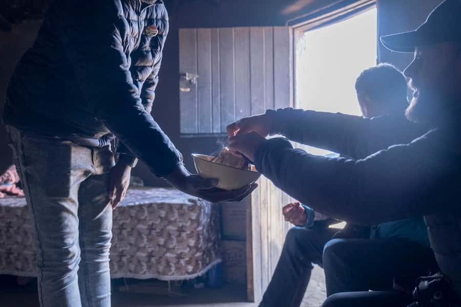 From Durban: Sani Pass, Lesotho and Basotho Village Day Trip - Basotho bread and a blanket for the day