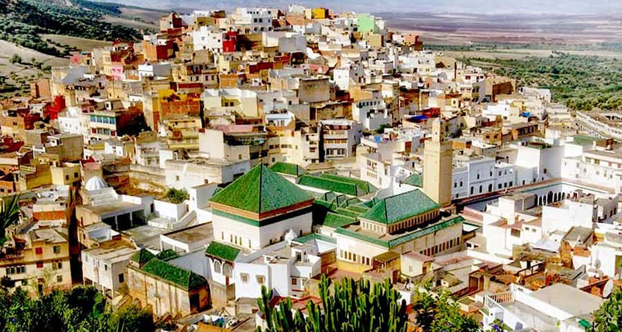 From Fes: Volubilis, Moulay Idriss, & Meknes Full-Day Trip - Leaving Fez in a small vehicle