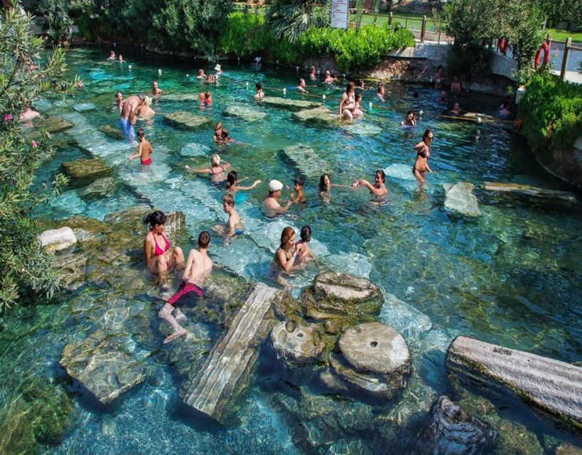 From Fethiye: Pamukkale & Hierapolis Day Trip w/ Meals - Exploring Hierapolis above the springs