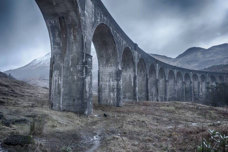 From Glasgow: Glenfinnan, Fort William, and Glencoe Day Trip - Glenfinnan Viaduct: film fame with a serious story nearby