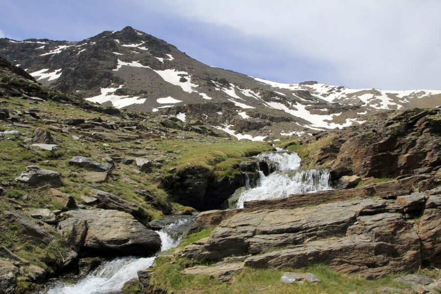 From Granada: Sierra Nevada Guided Day Trip - Snow in summer and streams through the high meadows