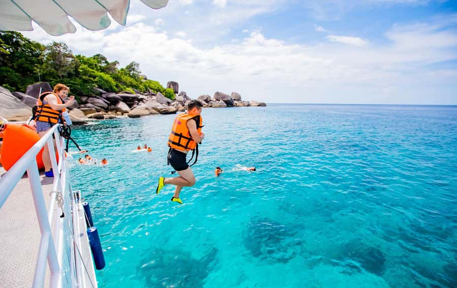 From Khao Lak: Similan Islands Day Trip by Luxury Catamaran - Food, drinks, and the return to Khao Lak