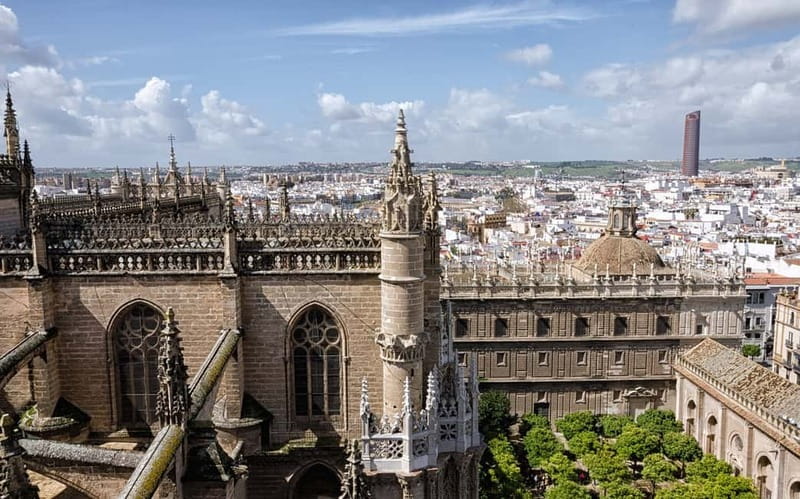 From Malaga: Seville Day Trip with Real Alcázar Tickets - Seeing Seville from the coach first