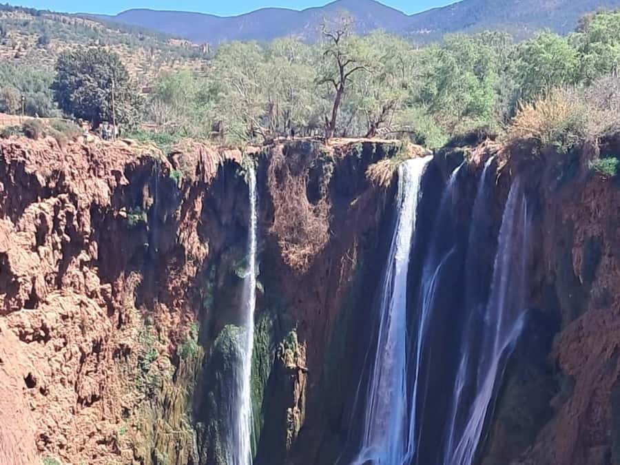 From Marrakech:Ouzoud Waterfalls Day Trip with Boat Tour - The boat ride under the falls