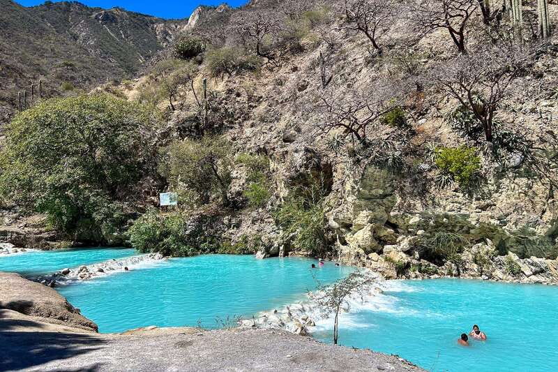 From Mexico City: Tolantongo Hot Springs Day Trip with Guide - Suspension bridge and walking options