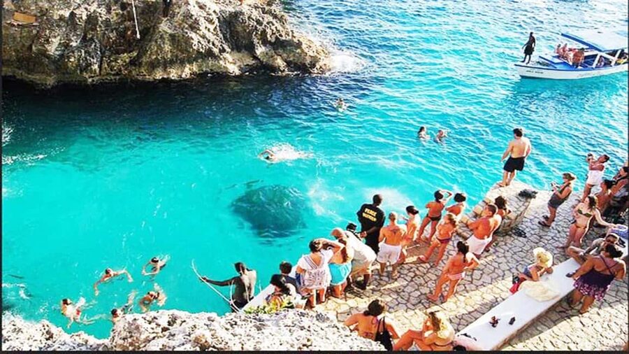 From Montego Bay: Negril Day Trip and Rick's Café Sunset - Seven Mile Beach gives the day its easygoing start