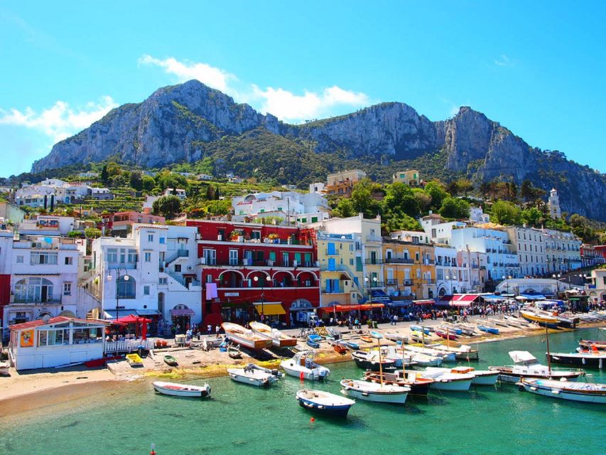 From Naples: Capri Boat Day Trip with Drinks - A traditional boat and a small group