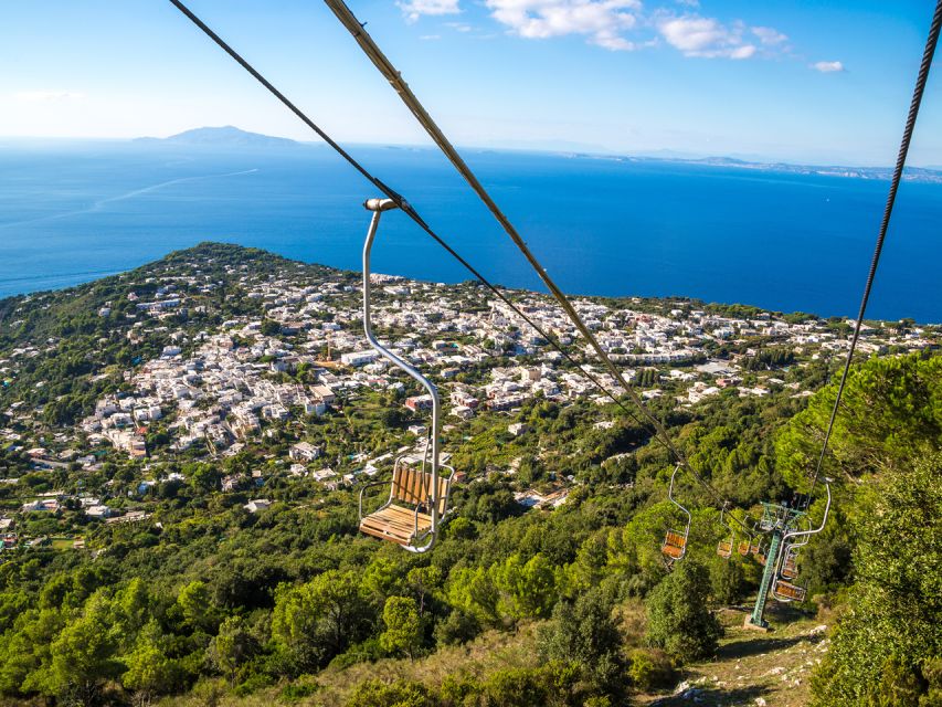 From Naples: Capri Day Trip with Ferry and Island Boat Tour - The included boat tour around the Faraglioni