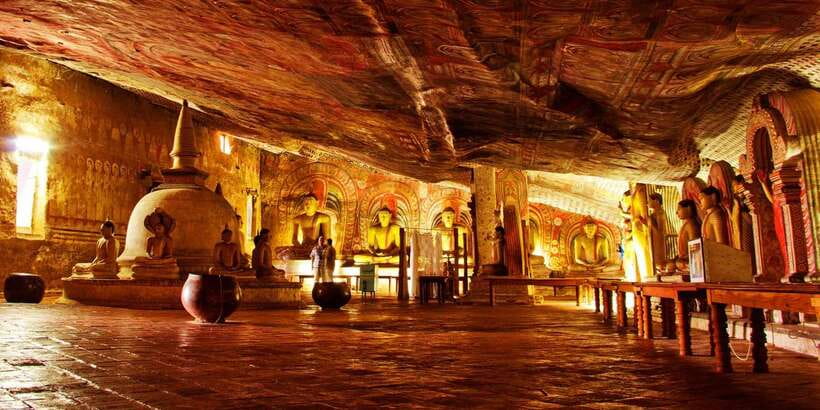 From Negombo: Sigiriya and Dambulla Day Trip and Safari - Dambulla’s caves and the short climb uphill