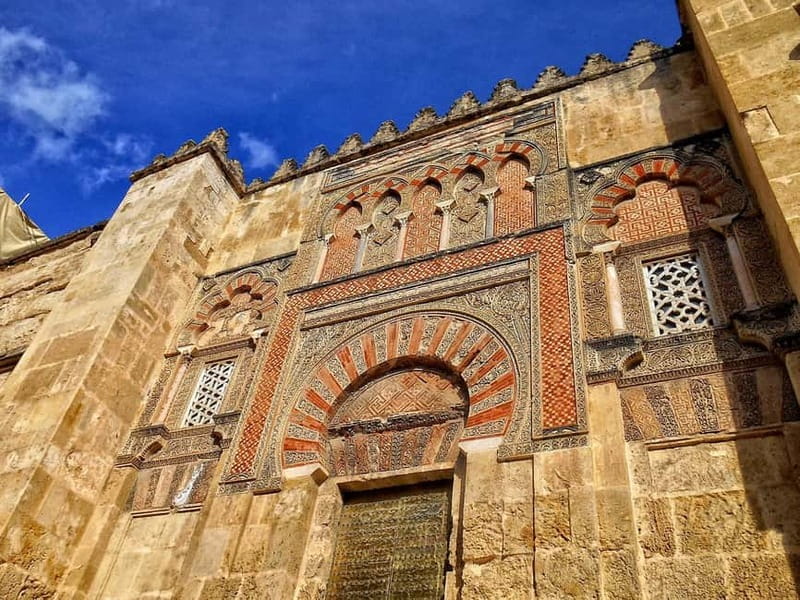 From Seville: Cordoba Day Trip with Guided Tour - First views: the Roman Bridge and Guadalquivir River