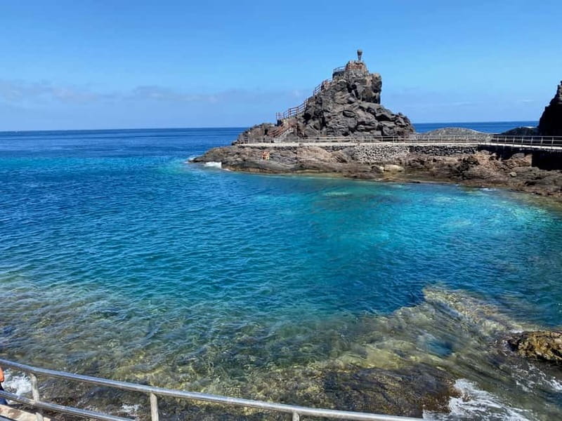 From Tenerife South: La Gomera Full-Day Trip with Transfers - Laguna Grande combines lunch and local sound
