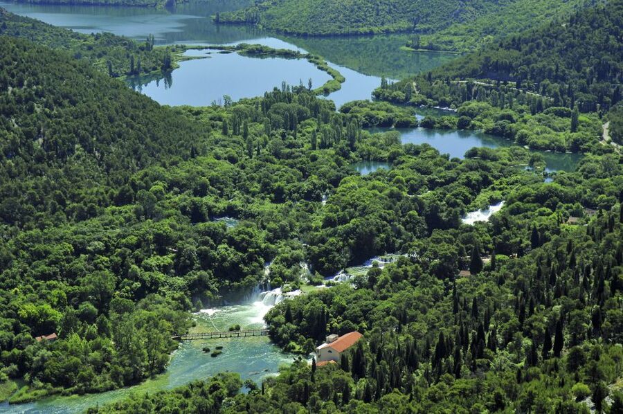 From Zadar: Krka National Park and Waterfalls Day Trip - Arriving by boat from Skradin