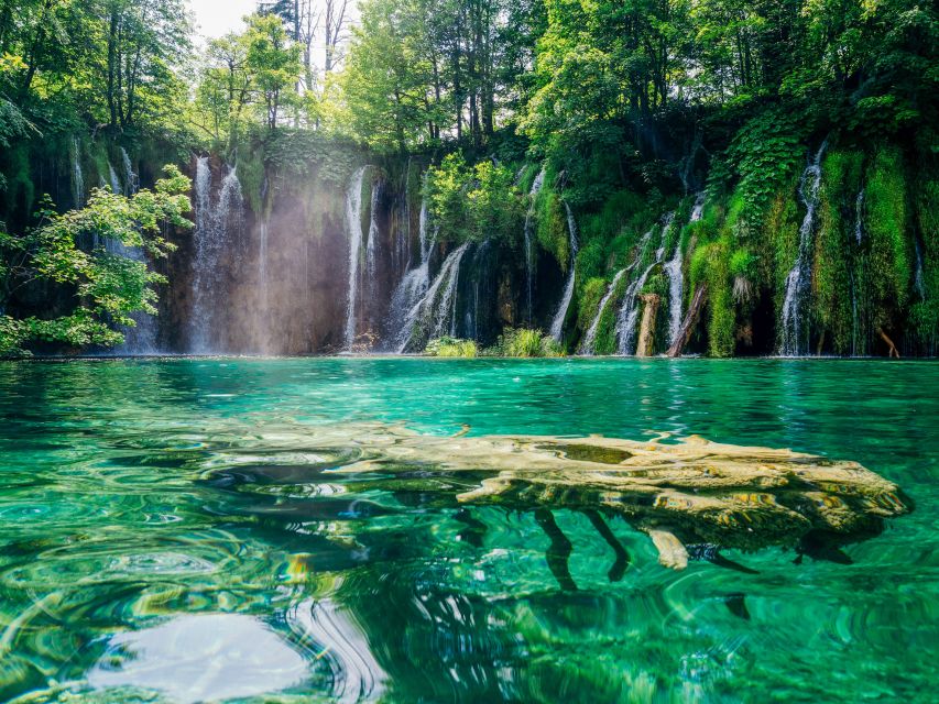 From Zagreb: Plitvice & Rastoke Guided Day Trip with Ticket - Walking the Lower Lakes and forest paths