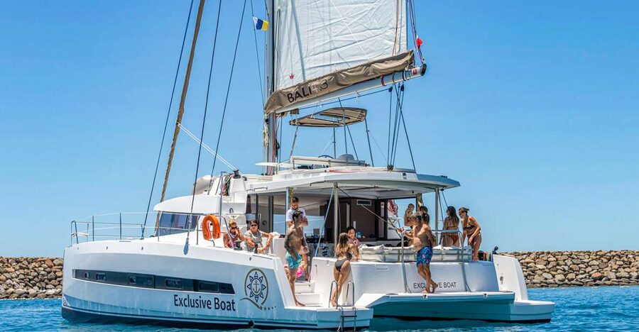 Gran Canaria: Catamaran Day Trip with Food and Drinks - The first stop: swimming, snorkeling, and paddleboards