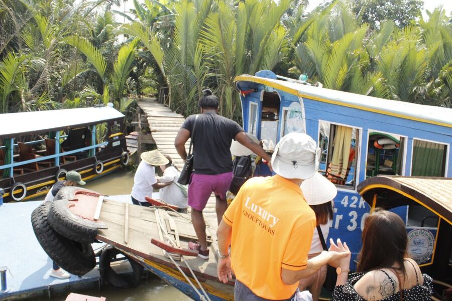 HCM: Mekong Delta, My Tho & Ben Tre Coconut Village - The sampan ride through coconut-lined canals
