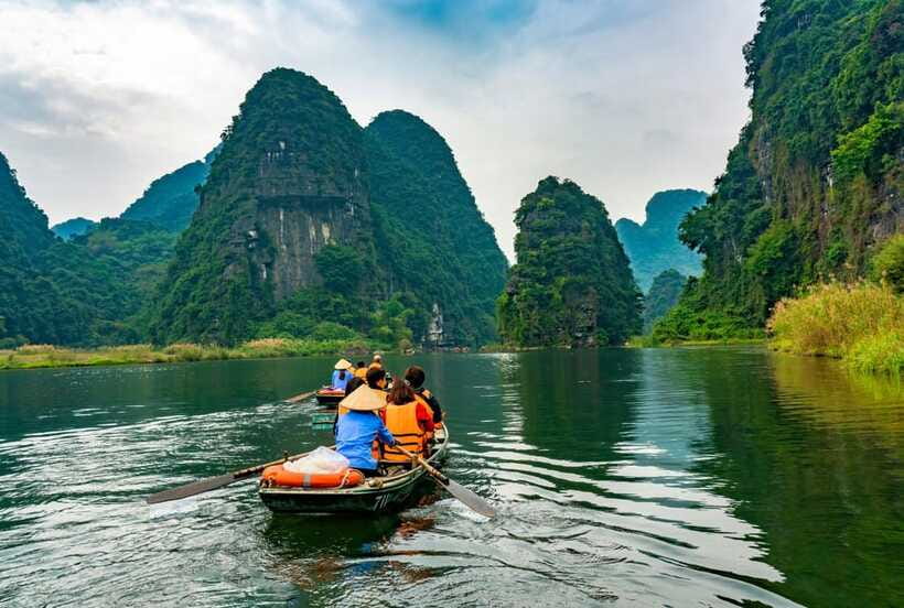 Hoa Lu, Tam Coc, & Mua Cave Day Trip with Lunch & Limousine - A bicycle ride through the countryside