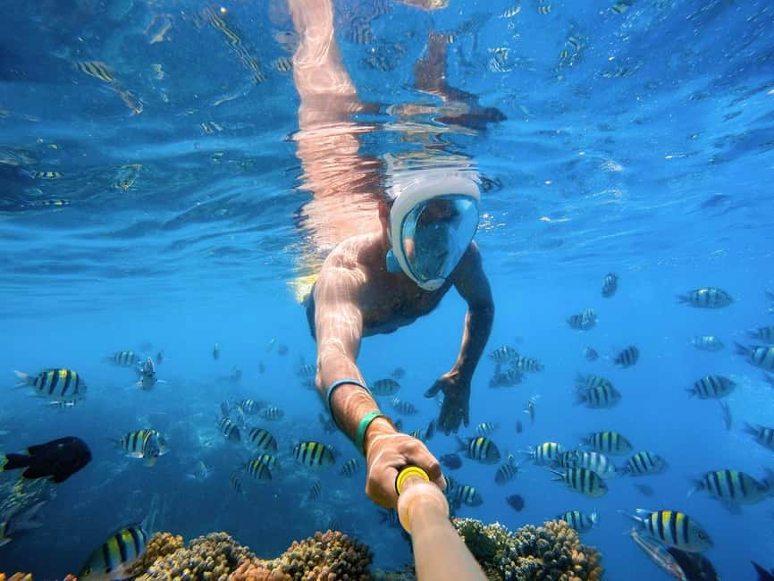 Hurghada: Orange Bay Day Trip with Water Sports and Lunch - Hotel pickup and the ride to the marina