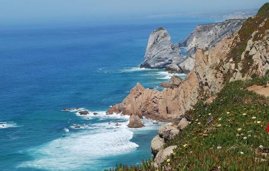 Magical Day Trip: Pena Palace, Sintra, CaboDa Roca & Cascais - Quinta da Regaleira rewards curiosity