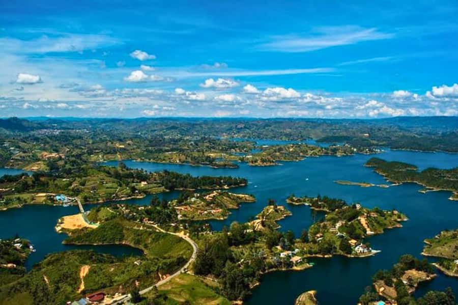 Medellin: Guatape and El Penol Rock Day Trip with Boat Ride - Alto del Chocho and Casa al Revés are optional extras