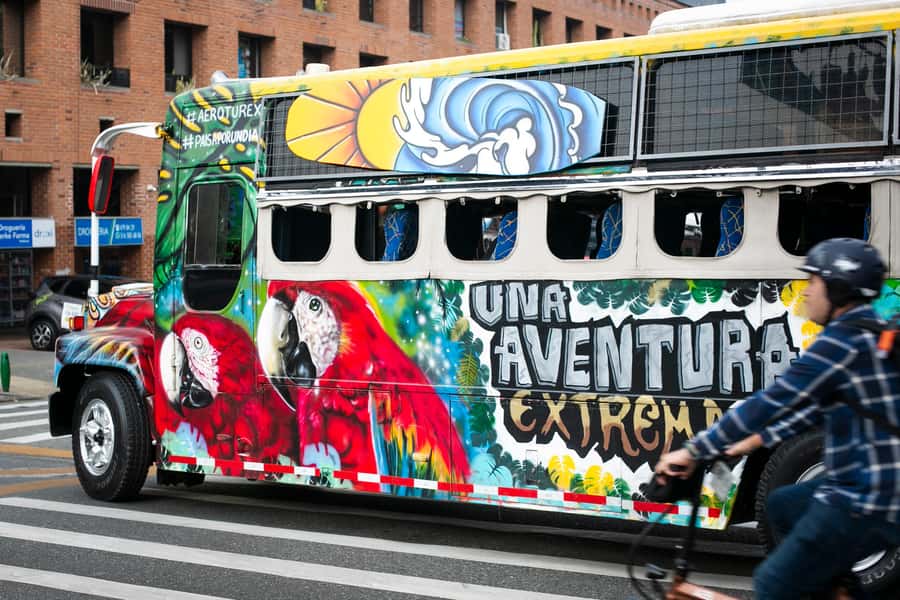 Medellin: Guatapé Day Trip & Boat to Pablo Escobar's Estate - Leaving Medellín on the themed bus