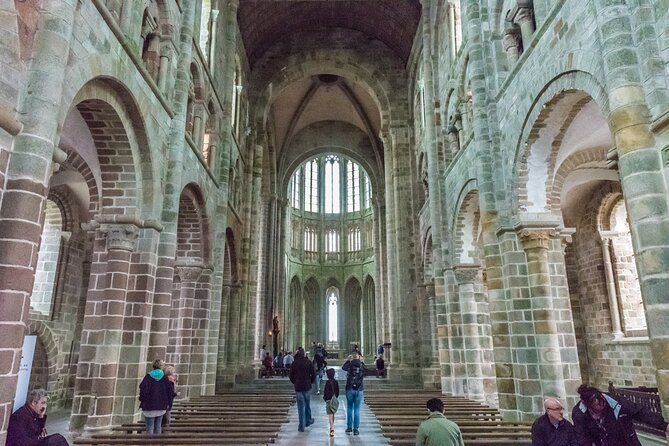 Mont Saint Michel Day Trip from Paris with English Speaking Guide - Exploring the Walled Village and Bay