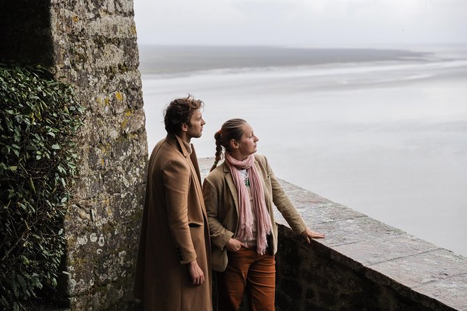 Mont Saint Michel Guided Day Trip with Abbey Entry from Paris - Walking the fortifications and village lanes