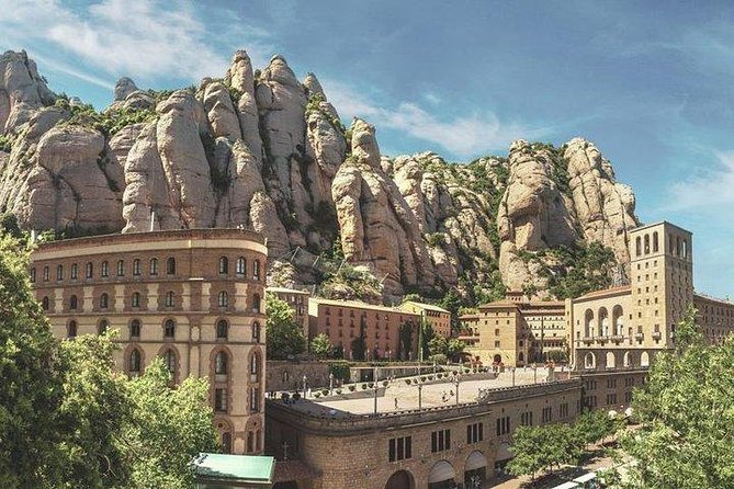 Montserrat Day Trip Private or Small Group with Basilica Tickets - Sampling Catalan products at the market