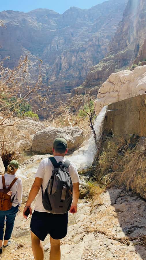 Muscat: Wadi Shab, Romantic Cave and Sinkhole Full-day Trip - The five-minute boat crossing begins Wadi Shab