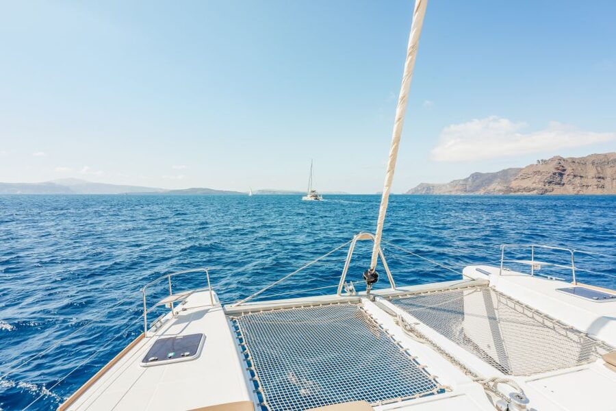 Santorini: Luxury Catamaran Day Trip with Meal and Open Bar - Red Beach, White Beach, and the swimming stops