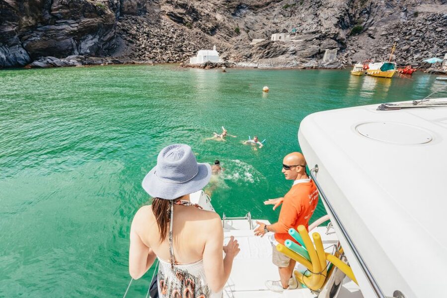 Santorini: Luxury Catamaran Day Trip with Meal and Open Bar - The route around Santorini’s caldera