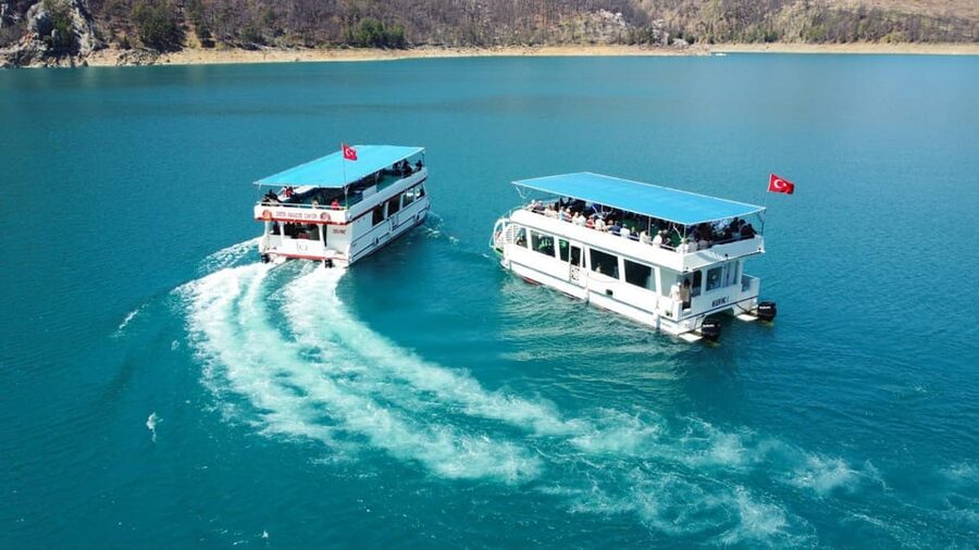 Side: Cabrio Bus and Boat Day Trip at the Green Lake - Riding the cabrio bus through orange country