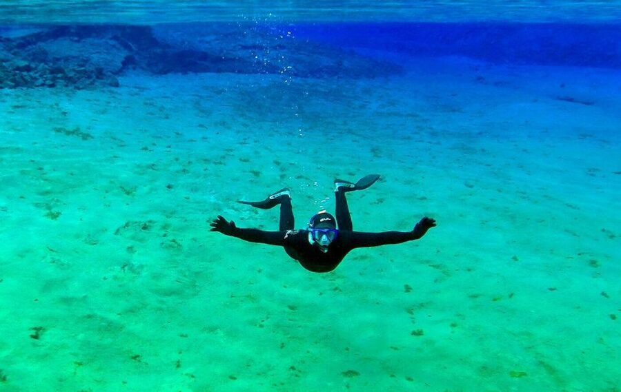 Silfra: Half-Day Snorkeling Day Trip with Underwater Photos - What you see while floating through the rift