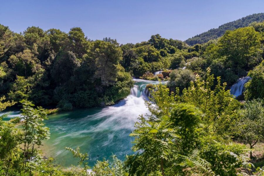 Split: Krka Waterfalls Guided Day Trip with Swim & Boat Tour - What Stipe adds to the day